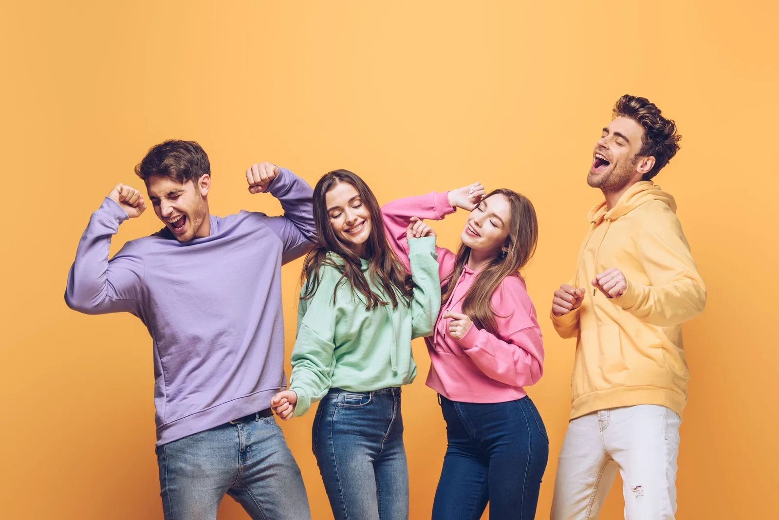 Energetic group dancing joyfully, reflecting modern website design.
